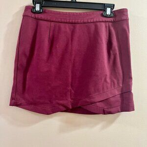 mini skirt nylon material and has stretch to it. Size 6